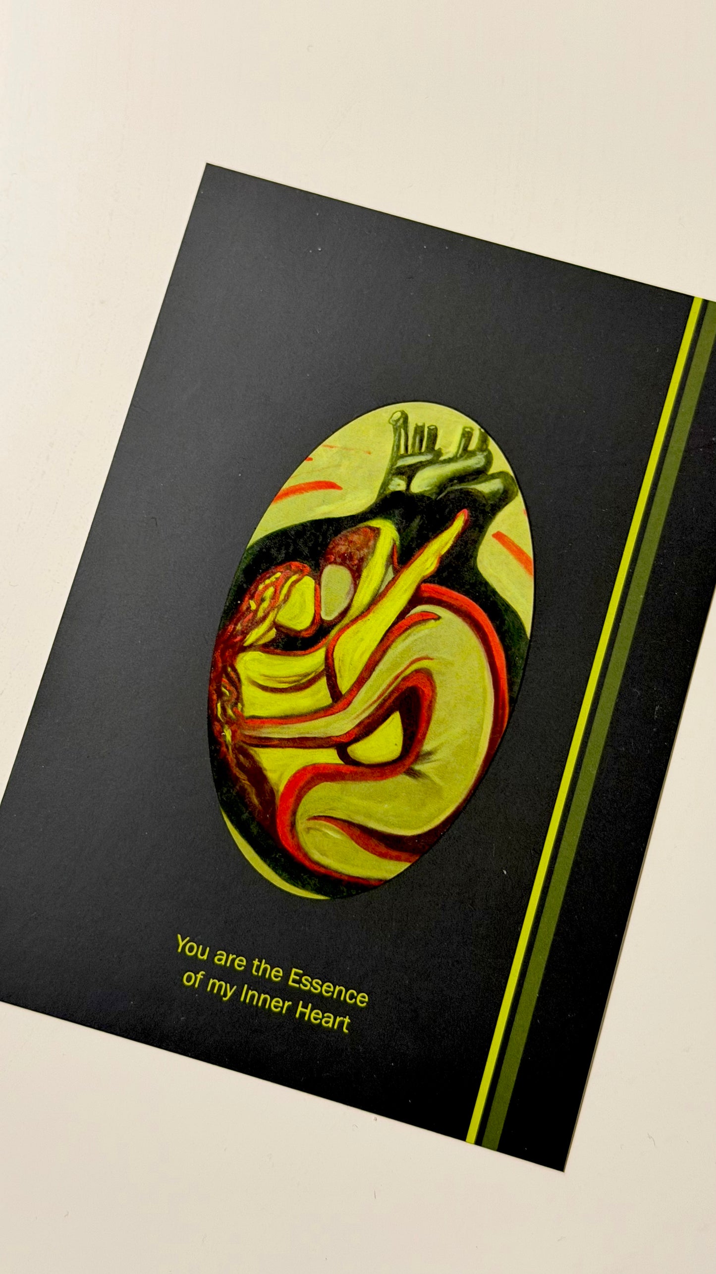 Postcard with a colorful illustration of a couple embracing on a black background