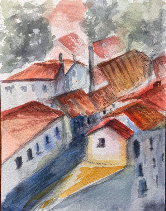 Watercolor painting of a Portuguese village with red roofs and greenery