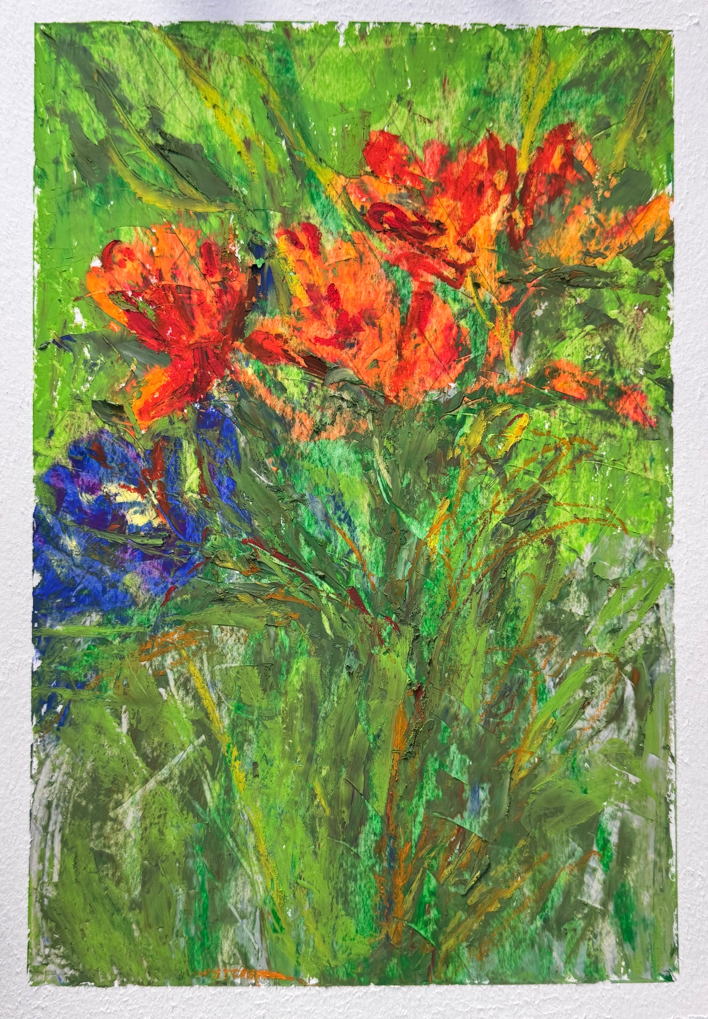Abstract painting of flowers with red, orange, and blue colors on a green background